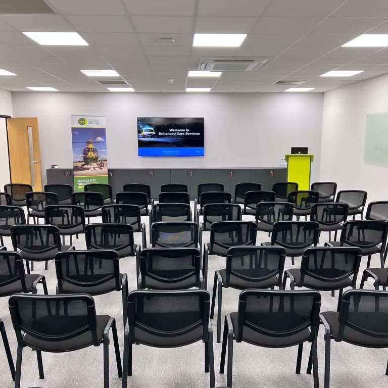 Chairs in front of screen